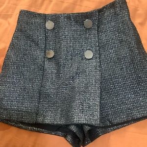 Very cute skort for sale. Had silver buttons on front.